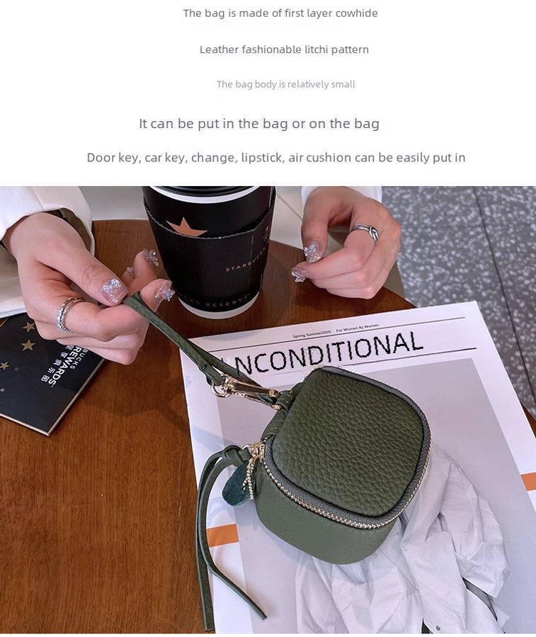 coin Purse head layer cowhide coin bag coin bag hand carrying leather key bag headset lipstick air cushion bag