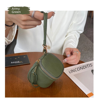 coin Purse head layer cowhide coin bag coin bag hand carrying leather key bag headset lipstick air cushion bag