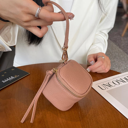 coin Purse head layer cowhide coin bag coin bag hand carrying leather key bag headset lipstick air cushion bag