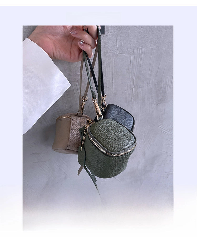 coin Purse head layer cowhide coin bag coin bag hand carrying leather key bag headset lipstick air cushion bag