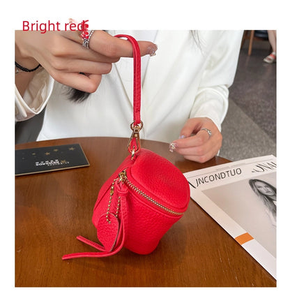 coin Purse head layer cowhide coin bag coin bag hand carrying leather key bag headset lipstick air cushion bag