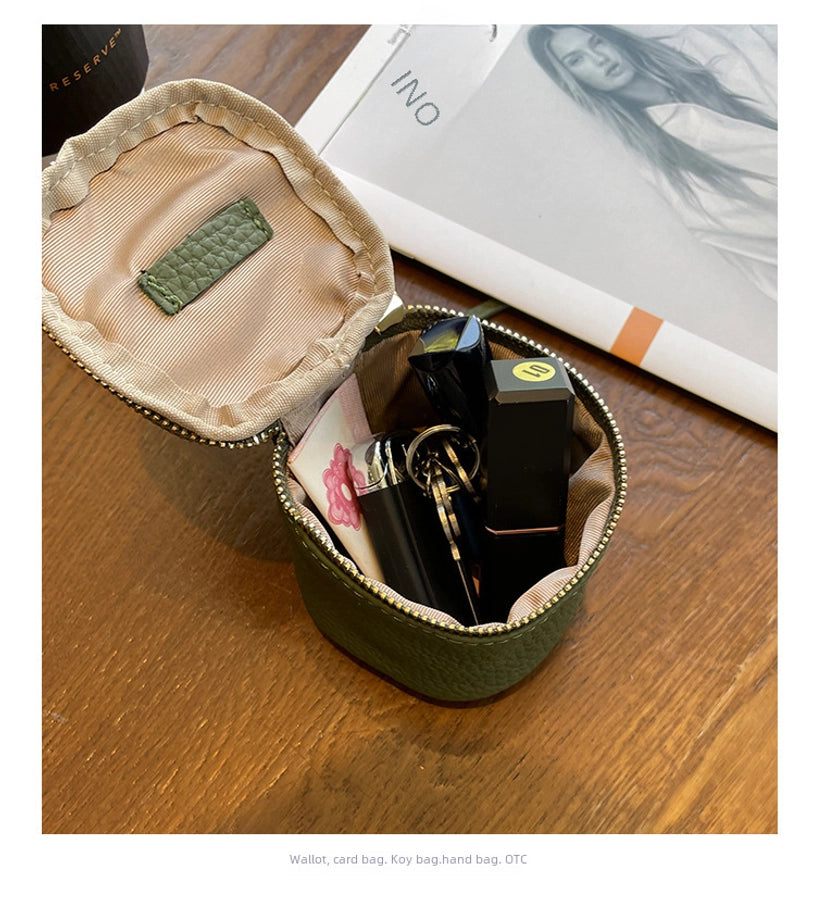 coin Purse head layer cowhide coin bag coin bag hand carrying leather key bag headset lipstick air cushion bag