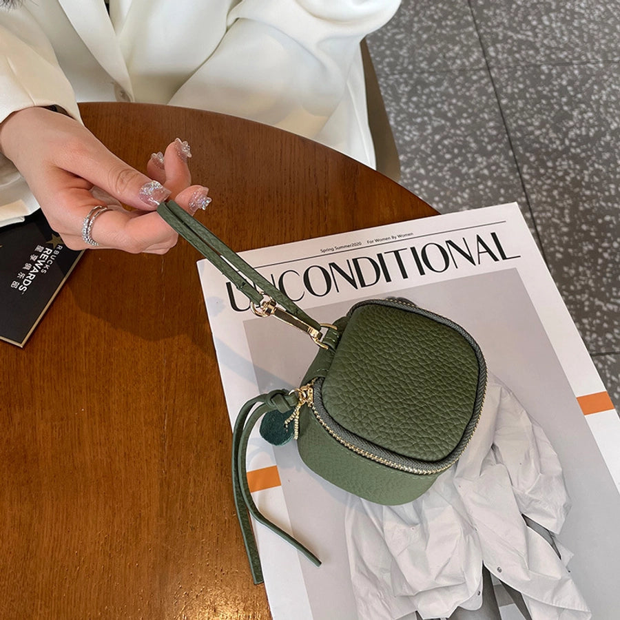 coin Purse head layer cowhide coin bag coin bag hand carrying leather key bag headset lipstick air cushion bag