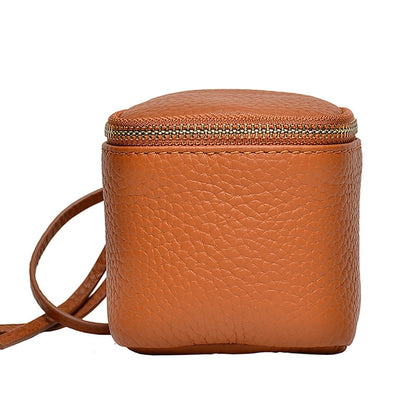 coin Purse head layer cowhide coin bag coin bag hand carrying leather key bag headset lipstick air cushion bag