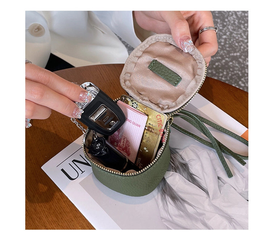 coin Purse head layer cowhide coin bag coin bag hand carrying leather key bag headset lipstick air cushion bag