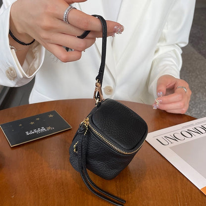 coin Purse head layer cowhide coin bag coin bag hand carrying leather key bag headset lipstick air cushion bag