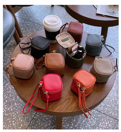 coin Purse head layer cowhide coin bag coin bag hand carrying leather key bag headset lipstick air cushion bag