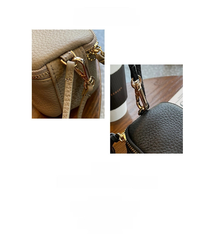 coin Purse head layer cowhide coin bag coin bag hand carrying leather key bag headset lipstick air cushion bag
