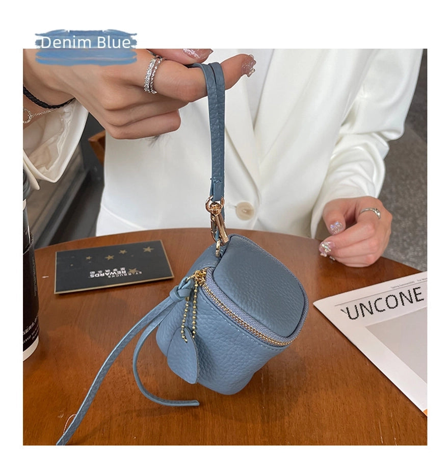 coin Purse head layer cowhide coin bag coin bag hand carrying leather key bag headset lipstick air cushion bag