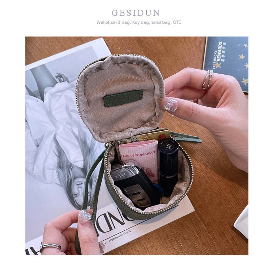 coin Purse head layer cowhide coin bag coin bag hand carrying leather key bag headset lipstick air cushion bag