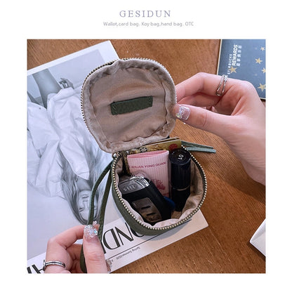 coin Purse head layer cowhide coin bag coin bag hand carrying leather key bag headset lipstick air cushion bag