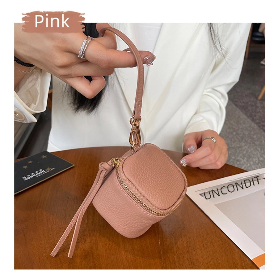 coin Purse head layer cowhide coin bag coin bag hand carrying leather key bag headset lipstick air cushion bag