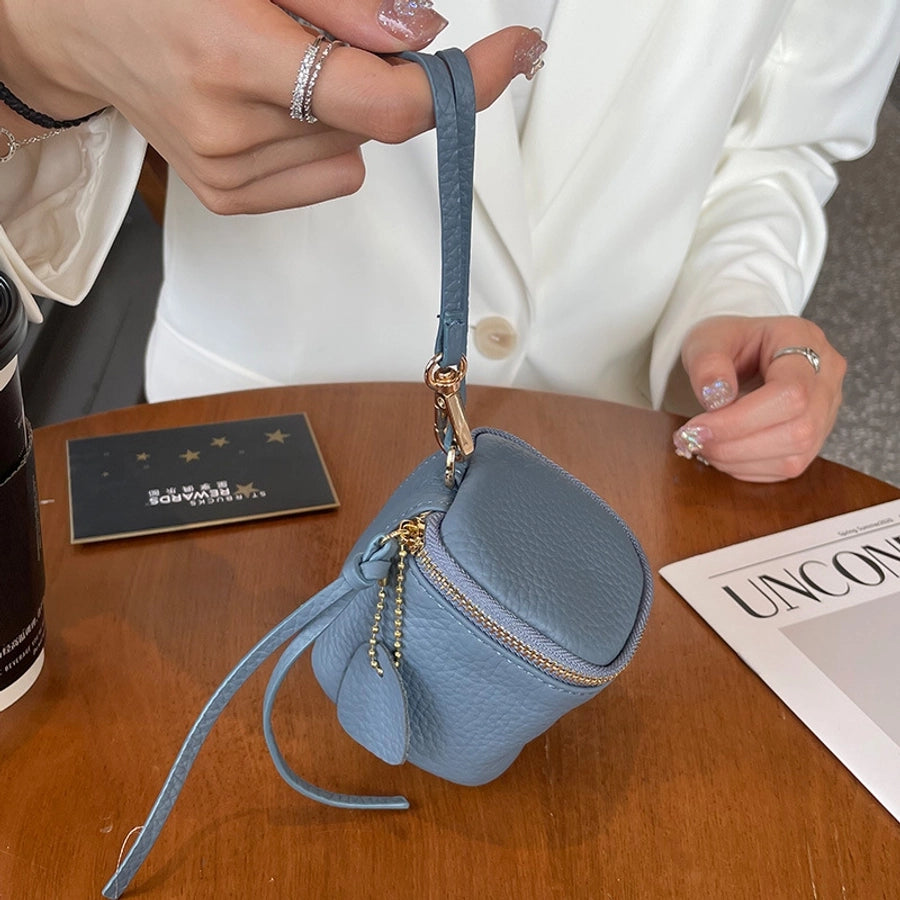 coin Purse head layer cowhide coin bag coin bag hand carrying leather key bag headset lipstick air cushion bag