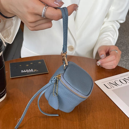 coin Purse head layer cowhide coin bag coin bag hand carrying leather key bag headset lipstick air cushion bag